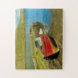 Rode boot bij laagwater legpuzzel