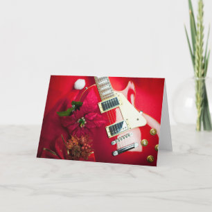 Rode elektrische gitaar met kerstversiering feestdagen kaart
