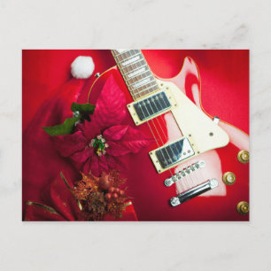 Rode elektrische gitaar met kerstversiering feestdagenkaart