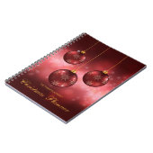 Rode feestelijke kerstcadeautjes met aangepaste te notitieboek (Linkerzijde)