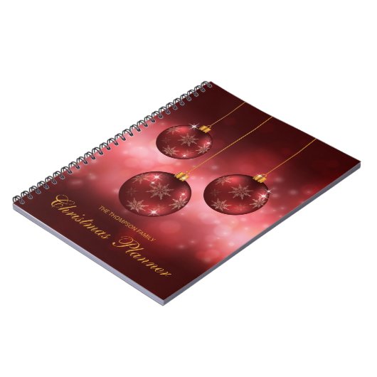 Rode feestelijke kerstcadeautjes met aangepaste te notitieboek (Linkerzijde)