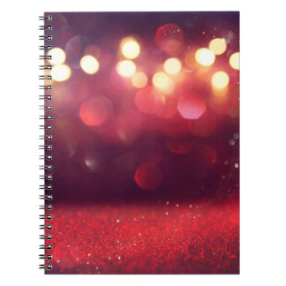 Rode glitter  licht achtergrond. defocusedba notitieboek