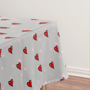 Rode harten op grijs tafelkleed