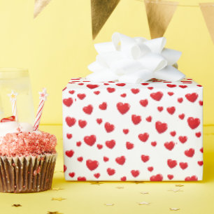 Rode harten op wit cadeaupapier