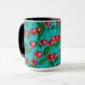 Rode kersen op turquoise mok (Voorkant links)