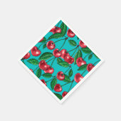 Rode kersen op turquoise servet (Hoek)