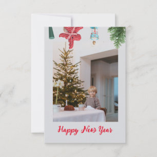 Rode kerstdecoratie met kerstkaart