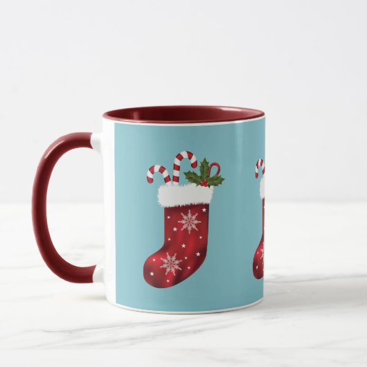 Rode kerstkussen op blauw met aangepaste naam mok (Links)