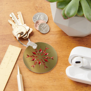 Rode kerststerren op goud sleutelhanger