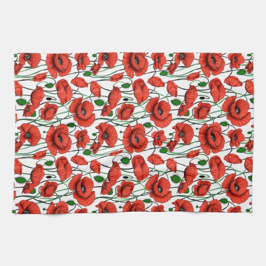 Rode klaprozen in een veld op wit theedoek (Horizontaal)