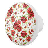 Rode klaprozen met groen gebladerte op witte achte keramische knop (Rechts)
