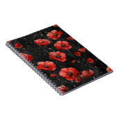 Rode klaprozen op zwart notitieboek (Rechterzijde)