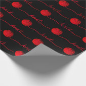 rode kogel van garen met messing cadeaupapier (Hoek)