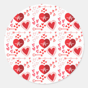 Rode liefdesharten en pijl ronde sticker