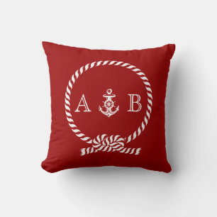 Rode neushelling en anker monogram kussen