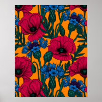 Rode papaver en blauwe cornbloemen op sinaasappel