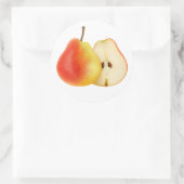 Rode peer in helften gesneden ronde sticker (Tas)