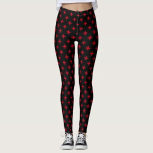 Rode polka-kruizen op zwart leggings