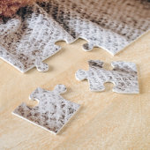 Rode pool in een trui onder een kerstboom legpuzzel (Zijkant)