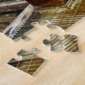 Rode roeiboot bij rustige Glasgowsteiger Legpuzzel (Zijkant)