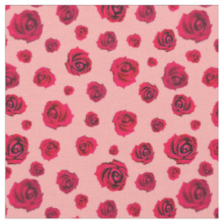 Rode rozen op roze stof