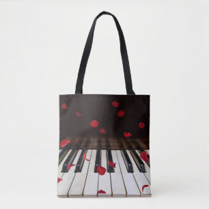 Rode rozenblaadjes op piano Canvas tas