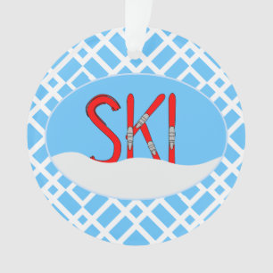 Rode ski's en sneeuw in een ovaal ornament