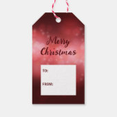 Rode snoepriet op een achtergrond van een rode keh cadeaulabel (Achterkant)