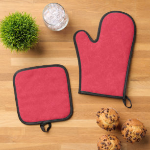 Rode textuurachtergrond met draaiend patroon ovenwant & pannenlap set