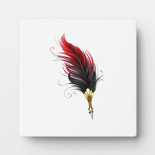 Rode veren pen met gouden penpunt fotoplaat