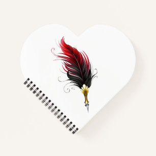 Rode veren pen met gouden penpunt notitieboek