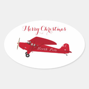 Rode Vliegtuig Merry kerstcadeautjes Ovale Sticker
