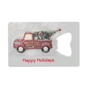 rode vrachtwagen op een grijze achtergrond kredietkaart flessenopener