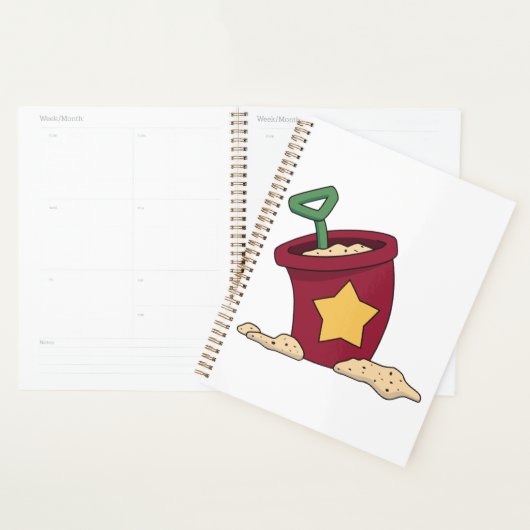 Rode zandemmer met ster en schop planner (Display)