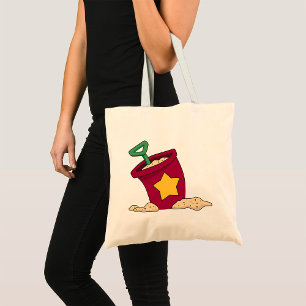 Rode zandemmer met ster en schop tote bag