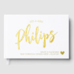 Romantic Gold Heart Nom en Mariage de script<br><div class="desc">Livre d'or mariage blanc avec votre nom de famille partagé dans un script doré écrit sur la couverture avec vos noms, lieu mariage et date de mariage à côté d'un coeur de feuille d'or. Livre d'or et blanc mariage avec un coeur doré et votre nom dans un grand script à...</div>