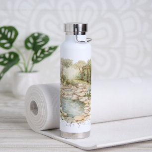 Romantisch pad met rotsen in de weide waterfles