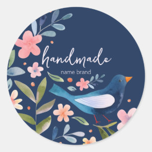 Rond Sticker avec oiseaux et fleurs sur fond bleu foncé