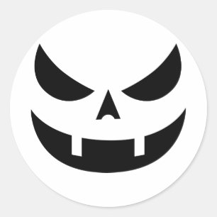 Rond Sticker Visage Citrouille À Grinning Fangé