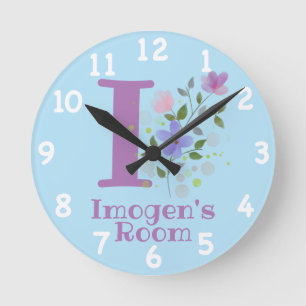 Ronde Horloge dans un design floral avec nom et initiale