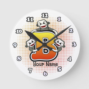 Ronde Horloge singe de chaussette B monogramme