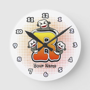Ronde Horloge singe de chaussette R monogramme