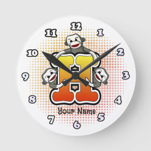Ronde Horloge singe en chaussette à monogramme H