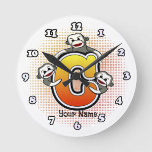 Ronde Horloge singe en chaussette C monogramme