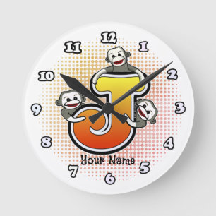 Ronde Horloge singe en chaussette J monogramme