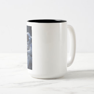 Rondhangende astronauten met een kopje koffie tweekleurige koffiemok