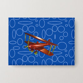 Rood Bi-vliegtuig op blauwe cirkels en lussen Button