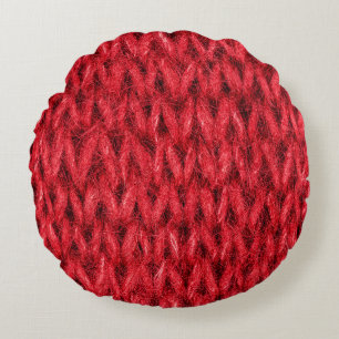 Rood breiwol textuur achtergrond. rond kussen