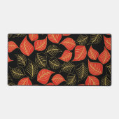 Rood en goud breed blad patroon op zwart bureaumat (Voorkant)