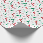Rood- en groene mousserende rendieren cadeaupapier (Hoek)